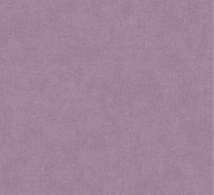 A close-up of a textured fabric or wallpaper swatch in a muted dusty lavender-purple color.